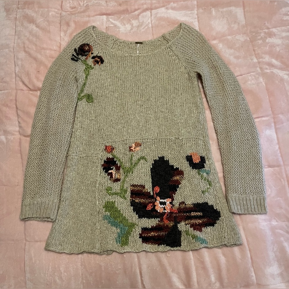 Caution to the Wind sweater with floral design
